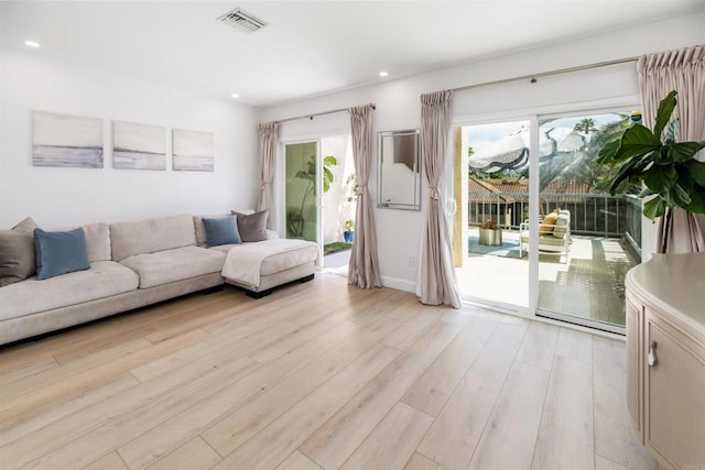2340 Caringa Way Unit B, Carlsbad, CA 92009 - living room featuring light wood-style floors and recessed lighting