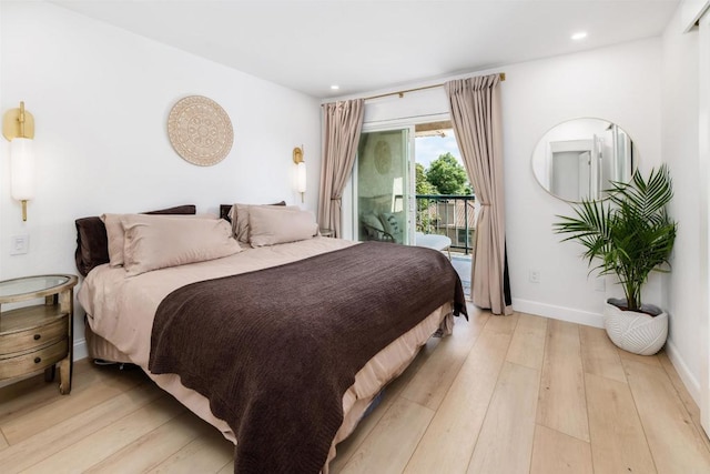2340 Caringa Way Unit B, Carlsbad, CA 92009 - bedroom featuring access to exterior, light wood-style floors, and recessed lighting