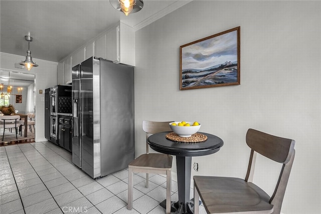 2662 E 2nd St Unit E1, Long Beach, CA 90803 - kitchen featuring stainless steel refrigerator with ice dispenser, light tile patterned floors, crown molding, and white cabinetry