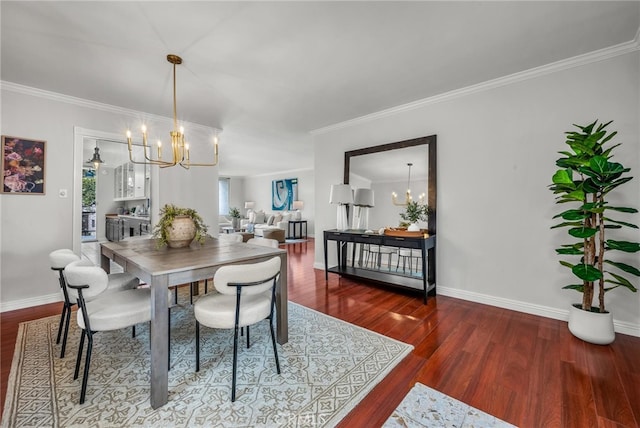 2662 E 2nd St Unit E1, Long Beach, CA 90803 - dining area featuring a chandelier, wood finished floors, and crown molding
