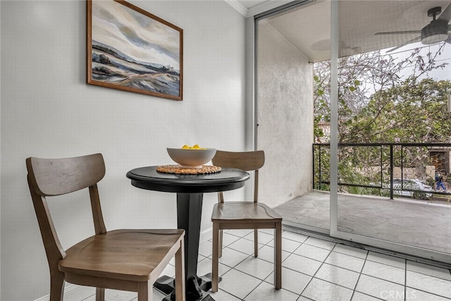 2662 E 2nd St Unit E1, Long Beach, CA 90803 - dining area with tile patterned flooring, a ceiling fan, ornamental molding, and expansive windows