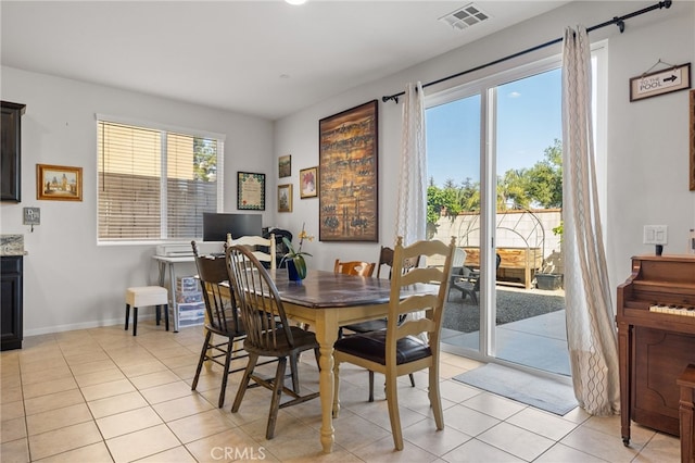 12200 White Rapids Way, Bakersfield, CA 93311 - dining room with light tile patterned floors and baseboards