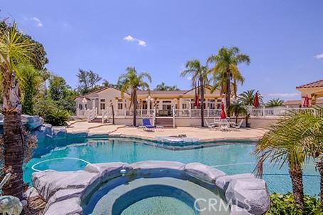 17470 Vanderhill Cir, Perris, CA 92570 - view of swimming pool featuring a pool with connected hot tub and a patio area