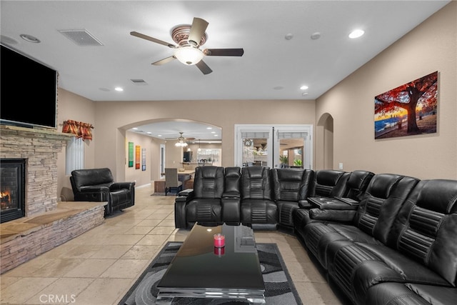 40139 15th St W, Palmdale, CA 93551 - living area featuring arched walkways, a ceiling fan, a fireplace, and recessed lighting