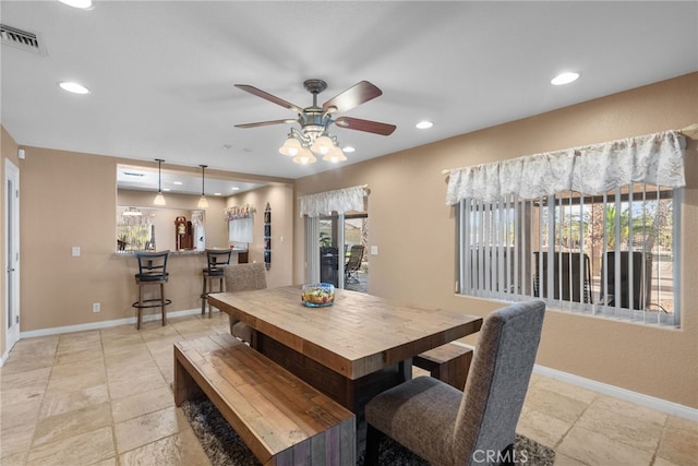 40139 15th St W, Palmdale, CA 93551 - dining area with a ceiling fan, recessed lighting, and stone tile flooring