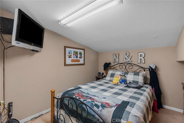 40139 15th St W, Palmdale, CA 93551 - bedroom with a textured ceiling, light carpet, and vaulted ceiling