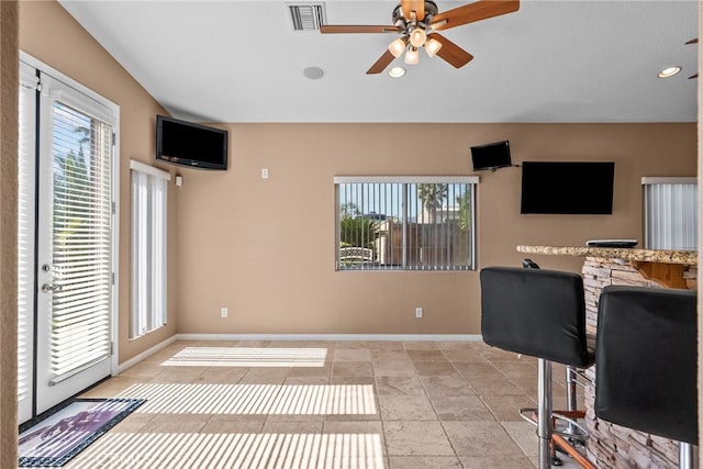 40139 15th St W, Palmdale, CA 93551 - living room featuring healthy amount of natural light, a ceiling fan, and recessed lighting