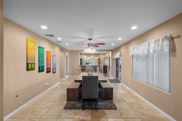 40139 15th St W, Palmdale, CA 93551 - dining space featuring ceiling fan, recessed lighting, and stone tile flooring