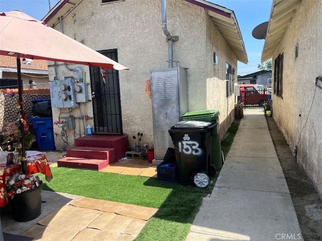 151 E 54th St, Los Angeles, CA 90011 - view of property exterior featuring stucco siding