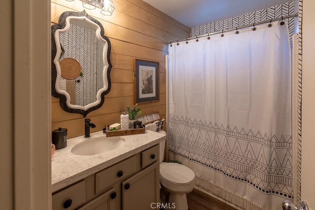 3031 E Lingard St, Lancaster, CA 93535 - full bathroom with vanity, wood walls, and a shower with curtain