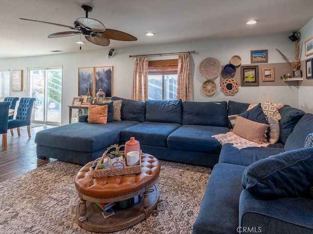 3031 E Lingard St, Lancaster, CA 93535 - living room with wood finished floors, ceiling fan, and recessed lighting