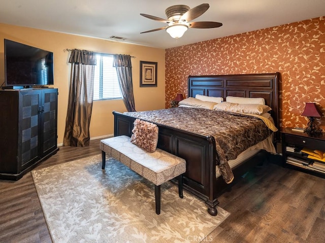 3031 E Lingard St, Lancaster, CA 93535 - bedroom featuring wood finished floors, wallpapered walls, and ceiling fan