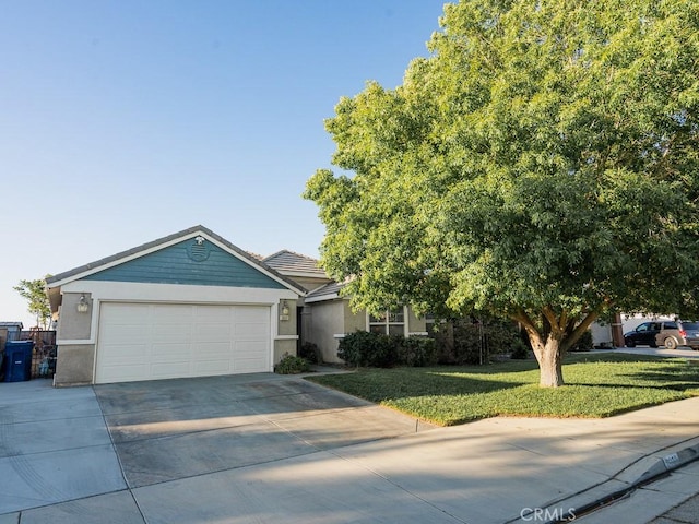 3031 E Lingard St, Lancaster, CA 93535 - ranch-style house featuring stucco siding, driveway, a front yard, and an attached garage