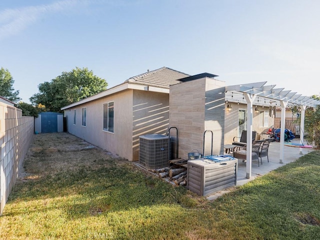 3031 E Lingard St, Lancaster, CA 93535 - view of side of home featuring a pergola, a patio, a shed, and a fenced backyard