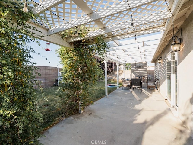 3031 E Lingard St, Lancaster, CA 93535 - fenced backyard featuring a pergola and a patio area