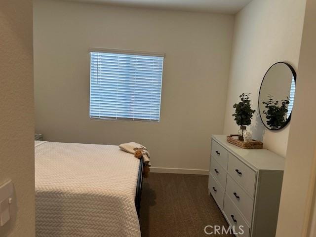 1658 Almondwood Dr, Orland, CA 95963 - bedroom with dark carpet and baseboards