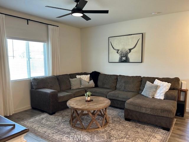 1658 Almondwood Dr, Orland, CA 95963 - living area featuring wood finished floors and a ceiling fan