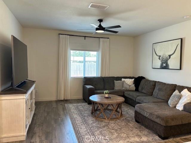 1658 Almondwood Dr, Orland, CA 95963 - living room featuring dark wood-style flooring and ceiling fan