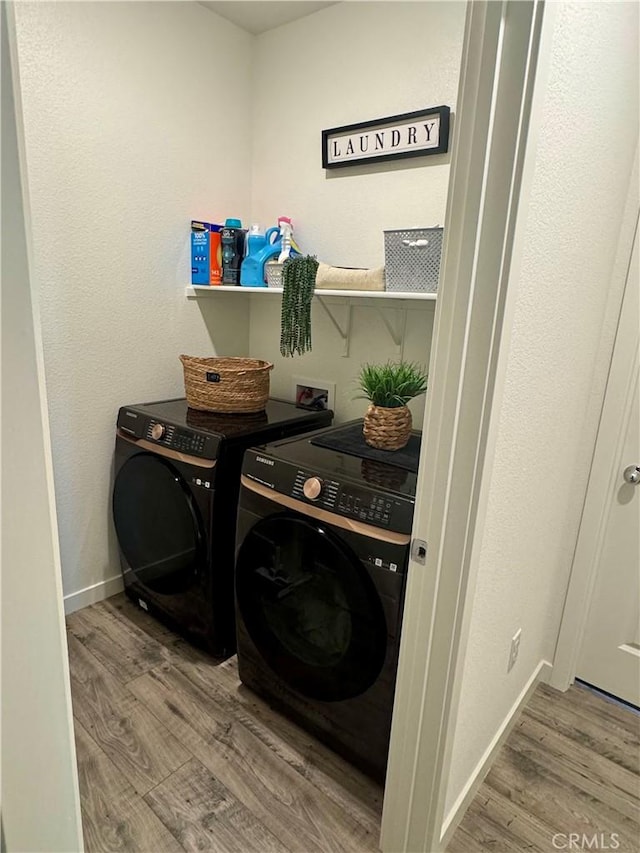 1658 Almondwood Dr, Orland, CA 95963 - washroom with independent washer and dryer and wood finished floors