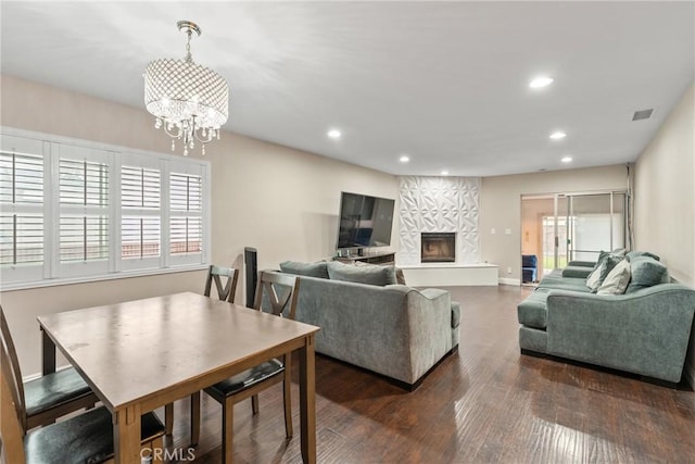 9548 Orizaba Ave, Downey, CA 90240 - living area featuring a chandelier, wood finished floors, recessed lighting, and a fireplace