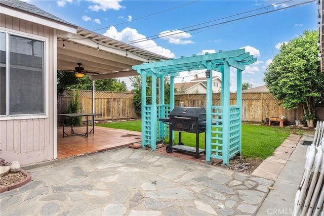 9548 Orizaba Ave, Downey, CA 90240 - fenced backyard with a pergola, area for grilling, a patio area, and ceiling fan