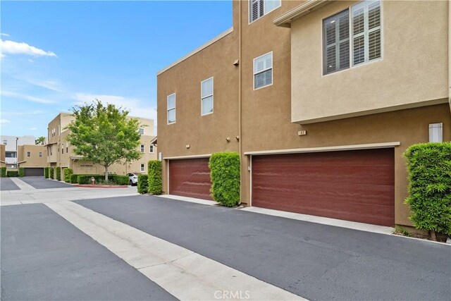 13131 Park Pl Unit 102, Hawthorne, CA 90250 - view of asphalt road with a residential view