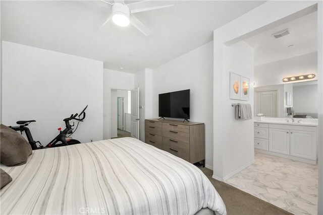 13131 Park Pl Unit 102, Hawthorne, CA 90250 - bedroom featuring light marble finish floors, ensuite bath, and ceiling fan