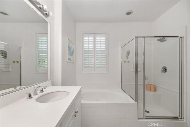 13131 Park Pl Unit 102, Hawthorne, CA 90250 - bathroom featuring a shower stall, vanity, and a bath