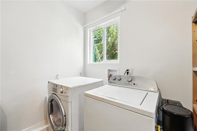 30156 Lexington Dr, Castaic, CA 91384 - laundry room featuring separate washer and dryer