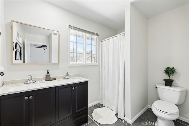 30156 Lexington Dr, Castaic, CA 91384 - bathroom featuring double vanity, tile patterned floors, a ceiling fan, and a shower with curtain
