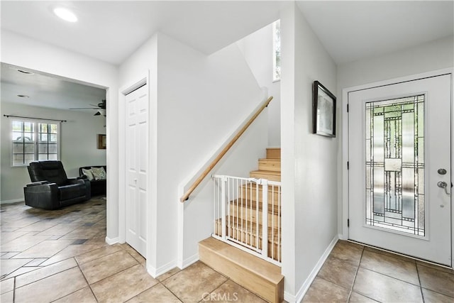 30156 Lexington Dr, Castaic, CA 91384 - entrance foyer featuring stairs, tile patterned floors, and a ceiling fan