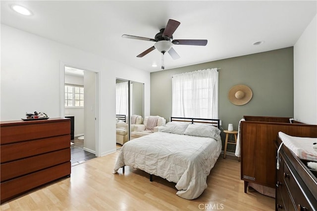 30156 Lexington Dr, Castaic, CA 91384 - bedroom with a closet, light wood-style flooring, a ceiling fan, and recessed lighting