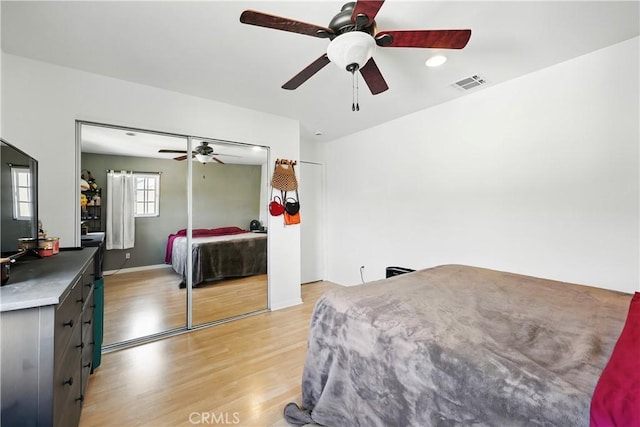 30156 Lexington Dr, Castaic, CA 91384 - bedroom with light wood finished floors and ceiling fan