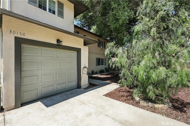 30156 Lexington Dr, Castaic, CA 91384 - garage with concrete driveway