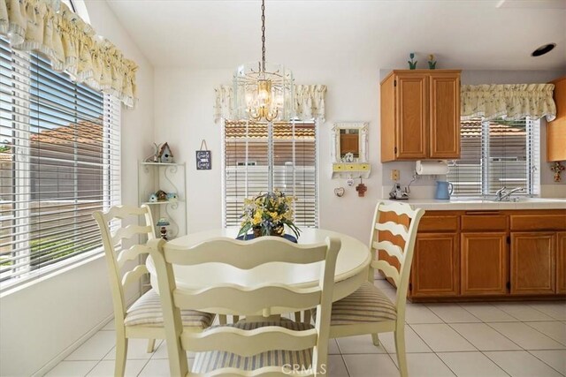 40209 Corte Peralta, Murrieta, CA 92562 - dining space featuring a chandelier and light tile patterned floors