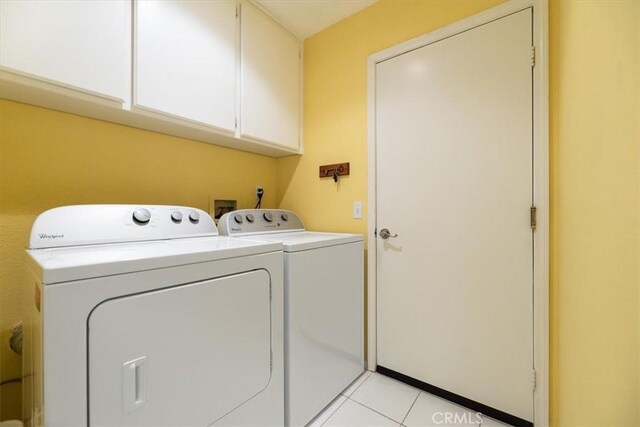 40209 Corte Peralta, Murrieta, CA 92562 - laundry area with cabinet space, independent washer and dryer, and light tile patterned floors