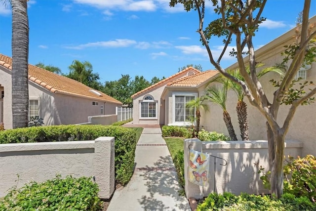 40209 Corte Peralta, Murrieta, CA 92562 - mediterranean / spanish-style home featuring a tile roof and stucco siding