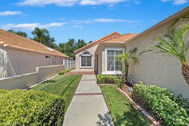40209 Corte Peralta, Murrieta, CA 92562 - doorway to property featuring a tiled roof and stucco siding