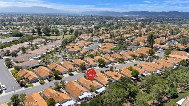 40209 Corte Peralta, Murrieta, CA 92562 - aerial view of property and surrounding area featuring a mountainous background and nearby suburban area
