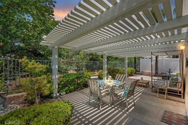 40209 Corte Peralta, Murrieta, CA 92562 - patio terrace at dusk with outdoor dining area, a fenced backyard, a patio, and a pergola