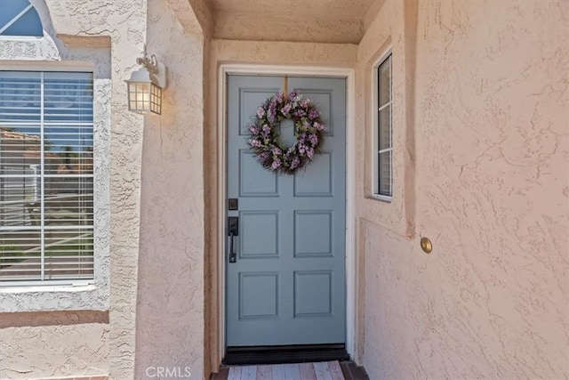 40209 Corte Peralta, Murrieta, CA 92562 - property entrance featuring stucco siding