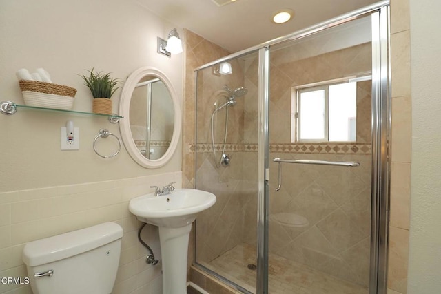 5026 Doreen Ave, Temple City, CA 91780 - full bathroom featuring a shower stall, tile walls, and wainscoting