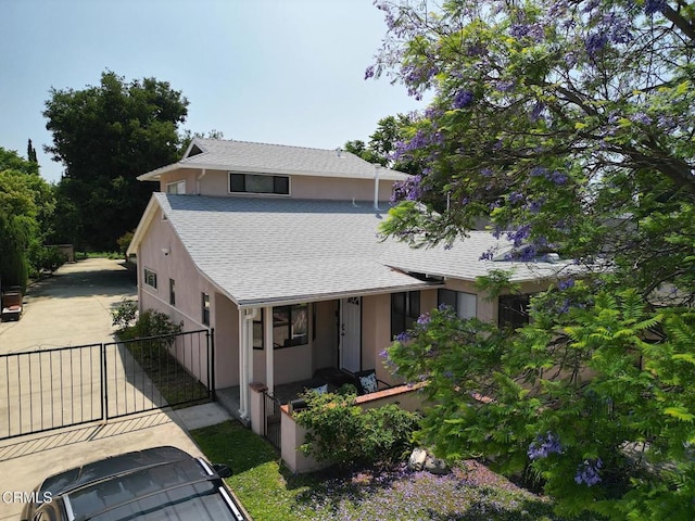 5026 Doreen Ave, Temple City, CA 91780 - view of front of house with stucco siding, a shingled roof, and a gate