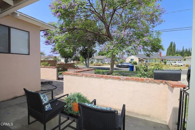 5026 Doreen Ave, Temple City, CA 91780 - view of patio / terrace with a residential view and a gate