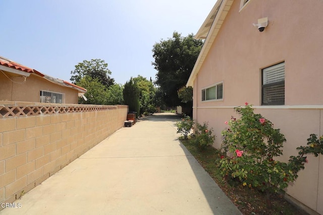 5026 Doreen Ave, Temple City, CA 91780 - view of side of property with a surveillance system and stucco siding