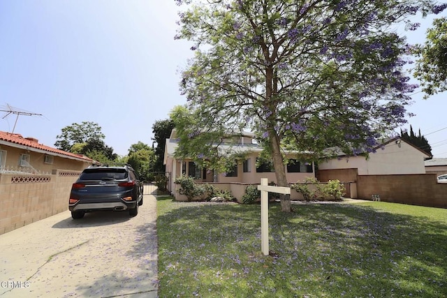 5026 Doreen Ave, Temple City, CA 91780 - obstructed view of property featuring concrete driveway and stucco siding