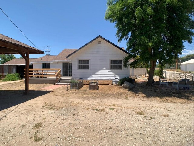 1390 Dewey Pl, Campo, CA 91906 - back of property with a wooden deck