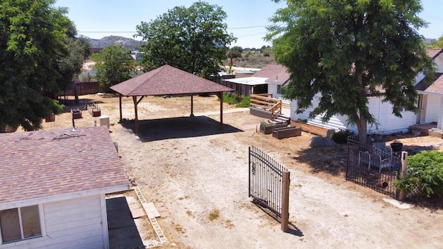 1390 Dewey Pl, Campo, CA 91906 - fenced yard featuring a detached carport and a gate
