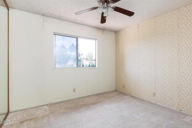 2026 Thomas Pl, West Covina, CA 91792 - spare room featuring a textured ceiling, carpet floors, and a ceiling fan