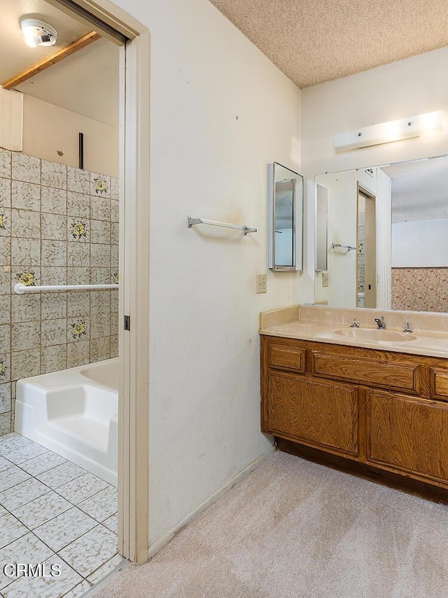 2026 Thomas Pl, West Covina, CA 91792 - bathroom featuring vanity,  shower combination, a textured ceiling, and tile patterned floors
